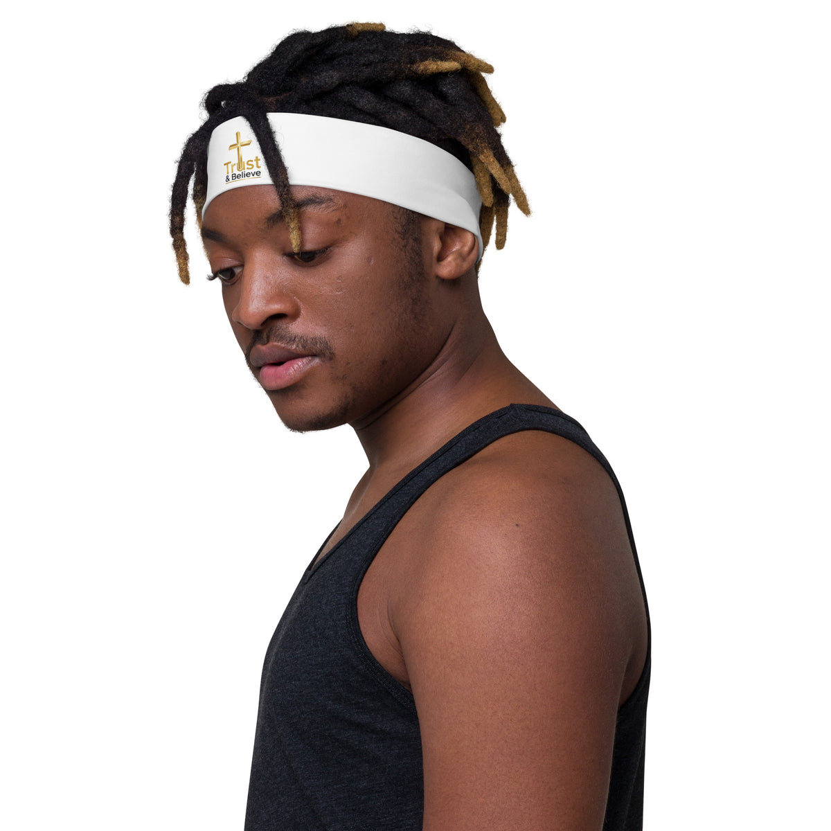 White Trust & Believe headband by Tristan's Outlet with colorful all-over print, shown from the front-left angle.