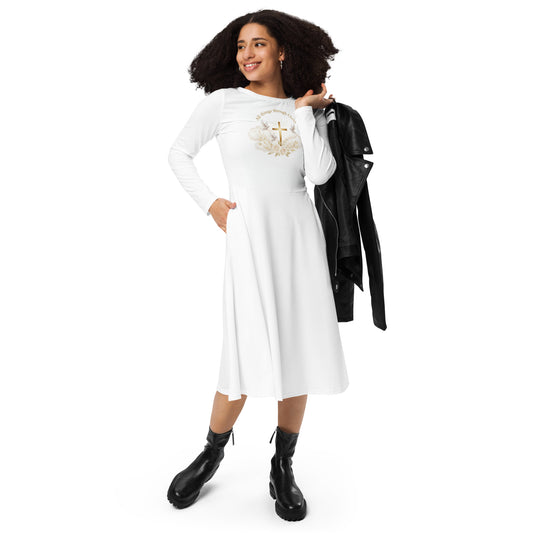 White graphic print long sleeve midi dress from Tristan's Outlet, featuring all-over colorful artwork on soft fabric.