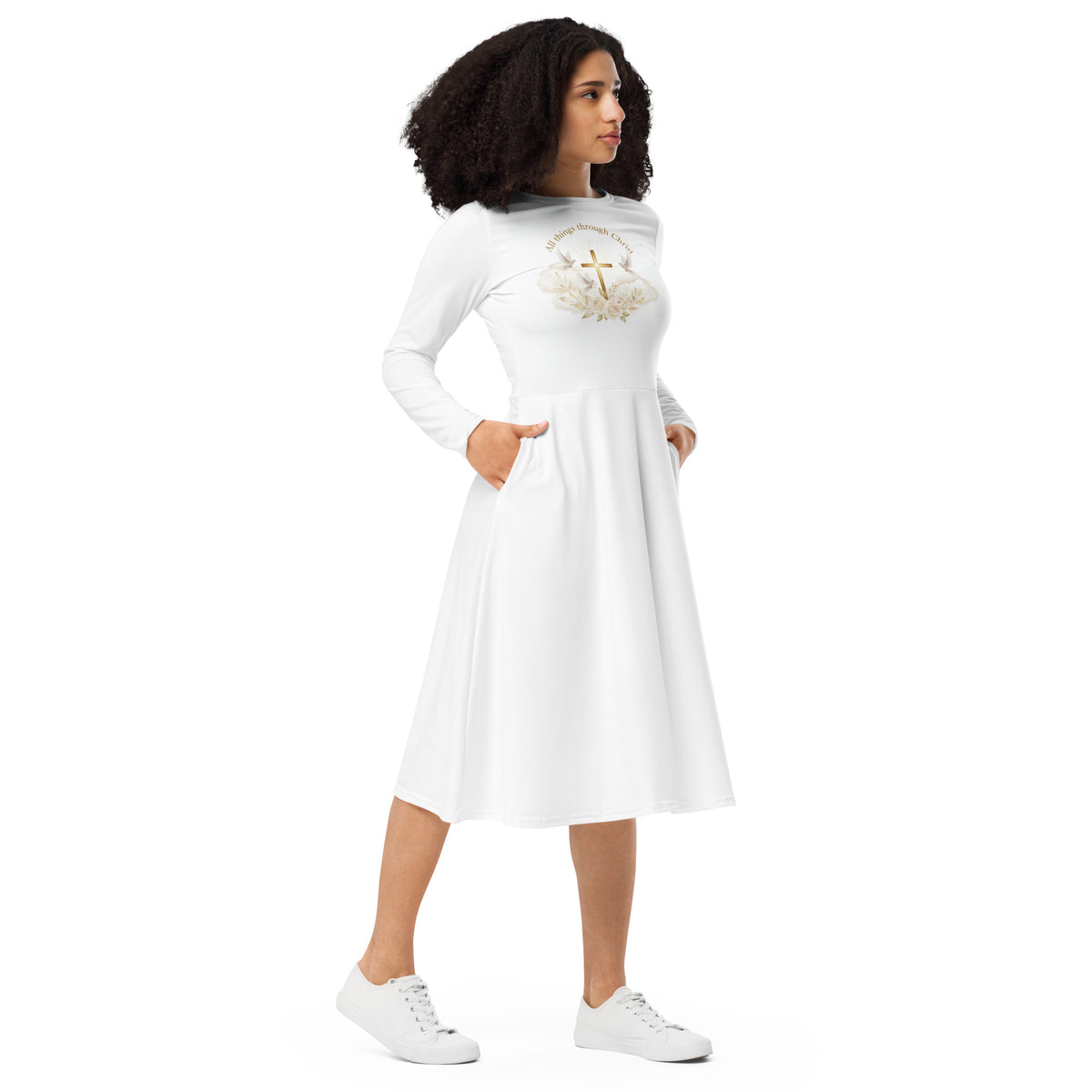 White graphic print long sleeve midi dress from Tristan's Outlet, shown from the right-front view with all-over print design.