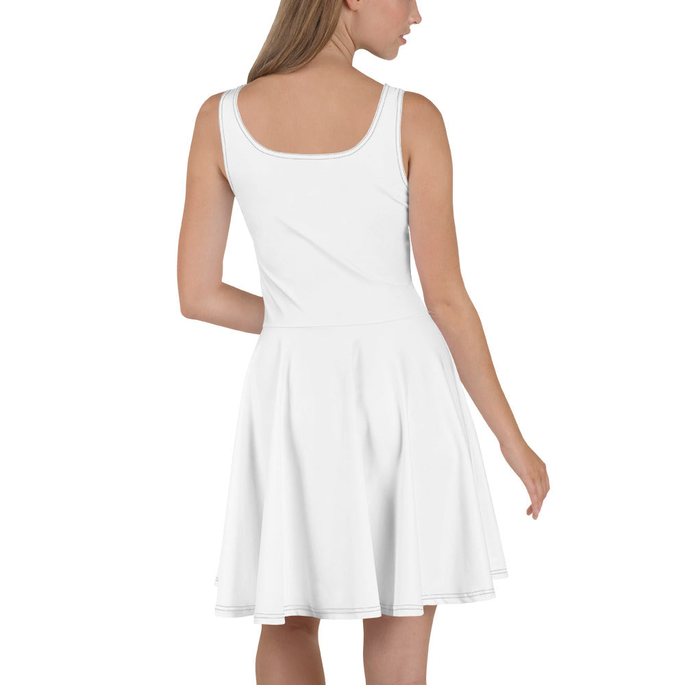 White graphic print skater dress from Tristan's Outlet showing the back view with all-over colorful print design.
