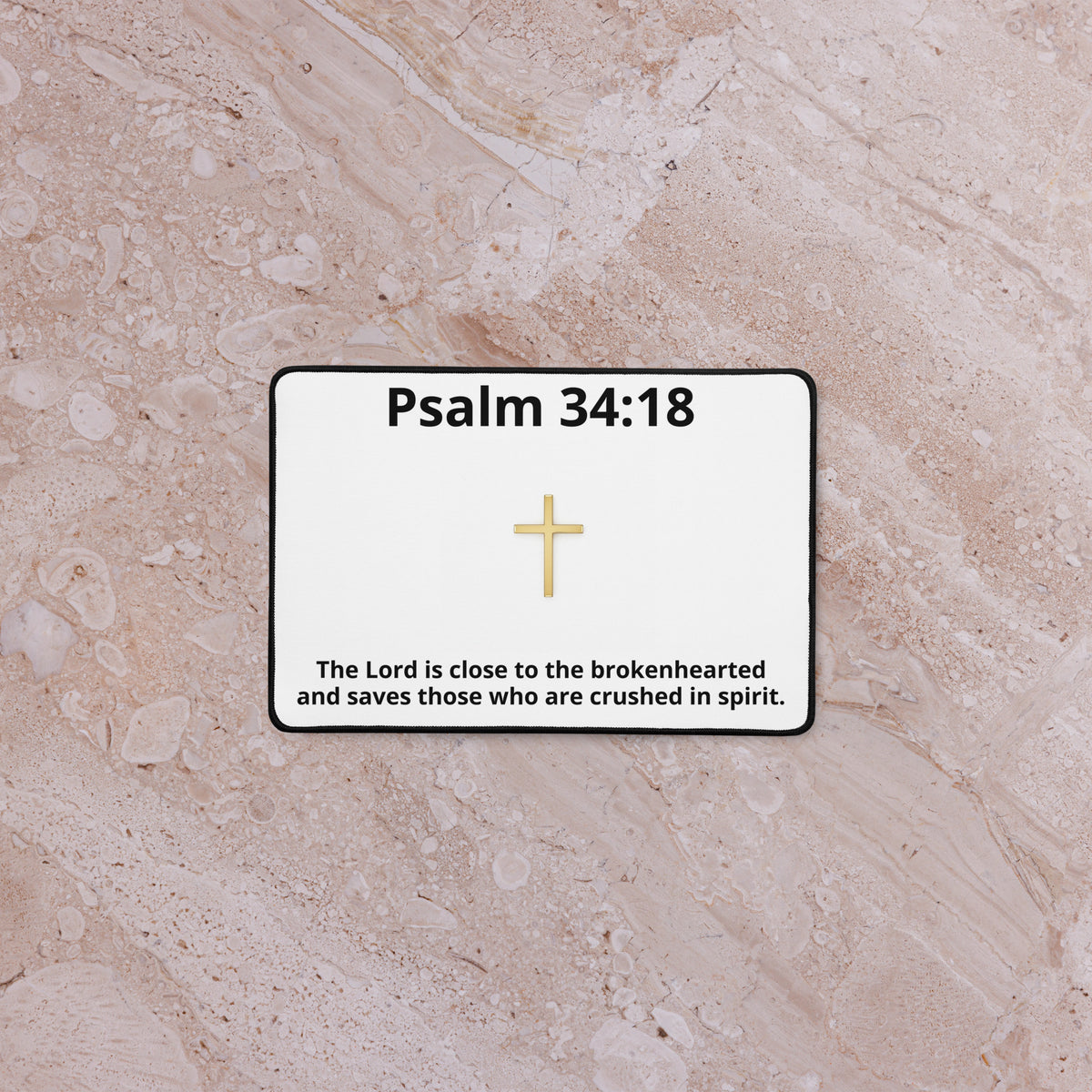 Black gold cross desk mat from Tristan's Outlet featuring an inspirational design, perfect for office or workspace decor.