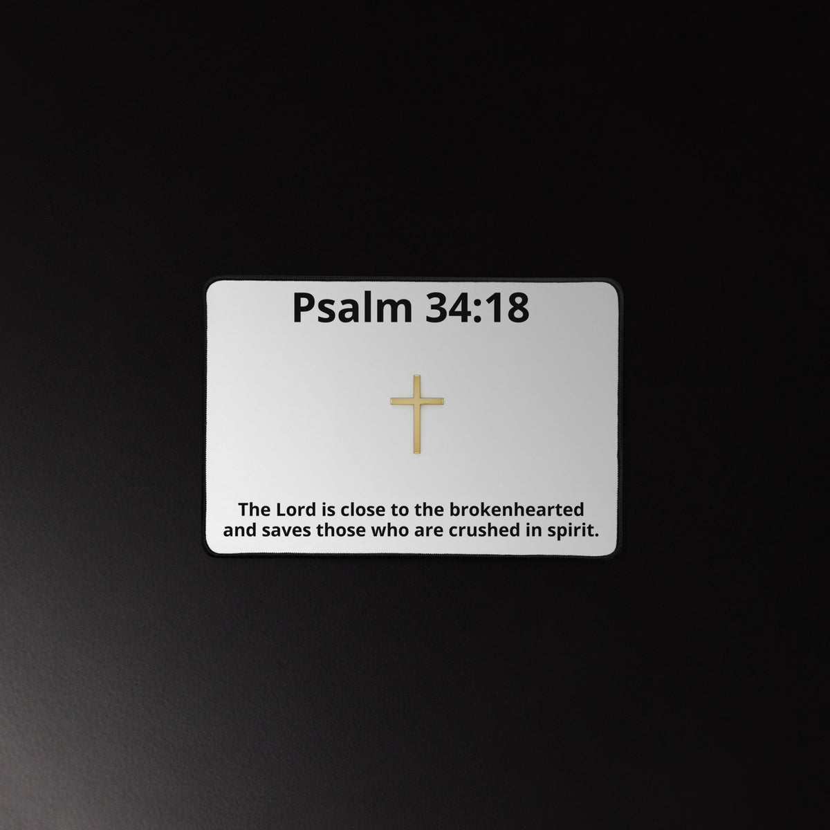 Black gold cross desk mat with inspirational design, 12x18 inches, from Tristan's Outlet, featuring a stylish cross motif on a smooth surface.