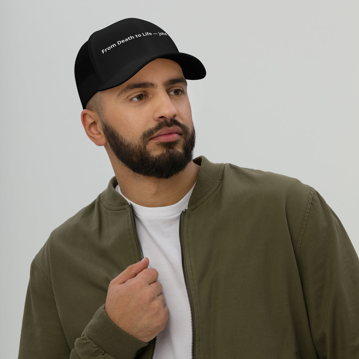 Black From Death to Life Trucker Hat featuring John 5:24 message with a retro style, ideal for Christian-themed casual wear.