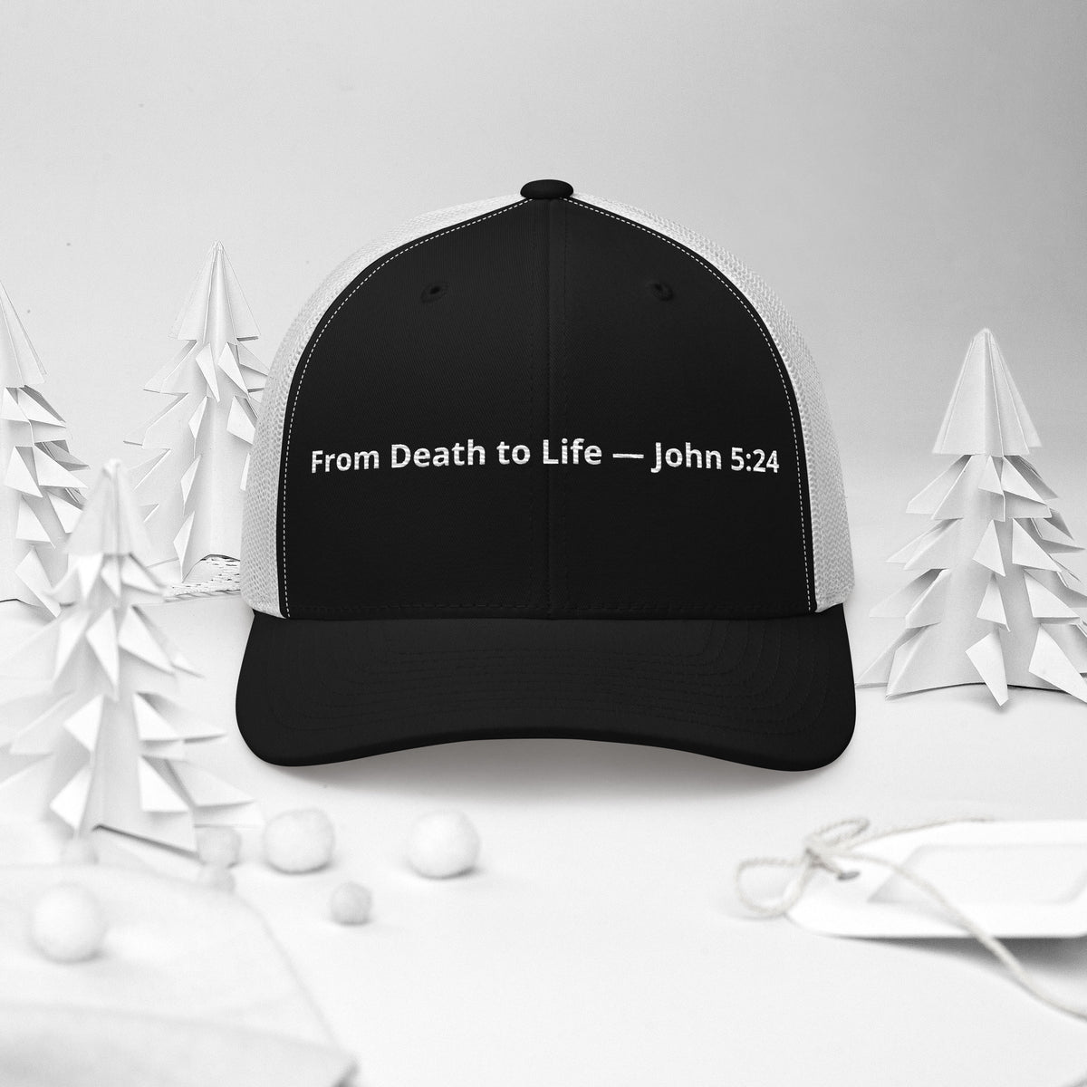 Black and white trucker hat with "From Death to Life" Christian message and John 5:24 Bible verse, featuring a retro style.