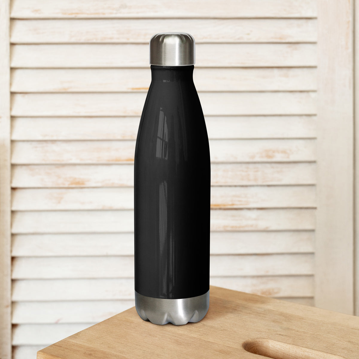 Black stainless steel insulated water bottle from Tristan's Outlet Faith Collection, 17 oz, with a sleek design and secure lid.