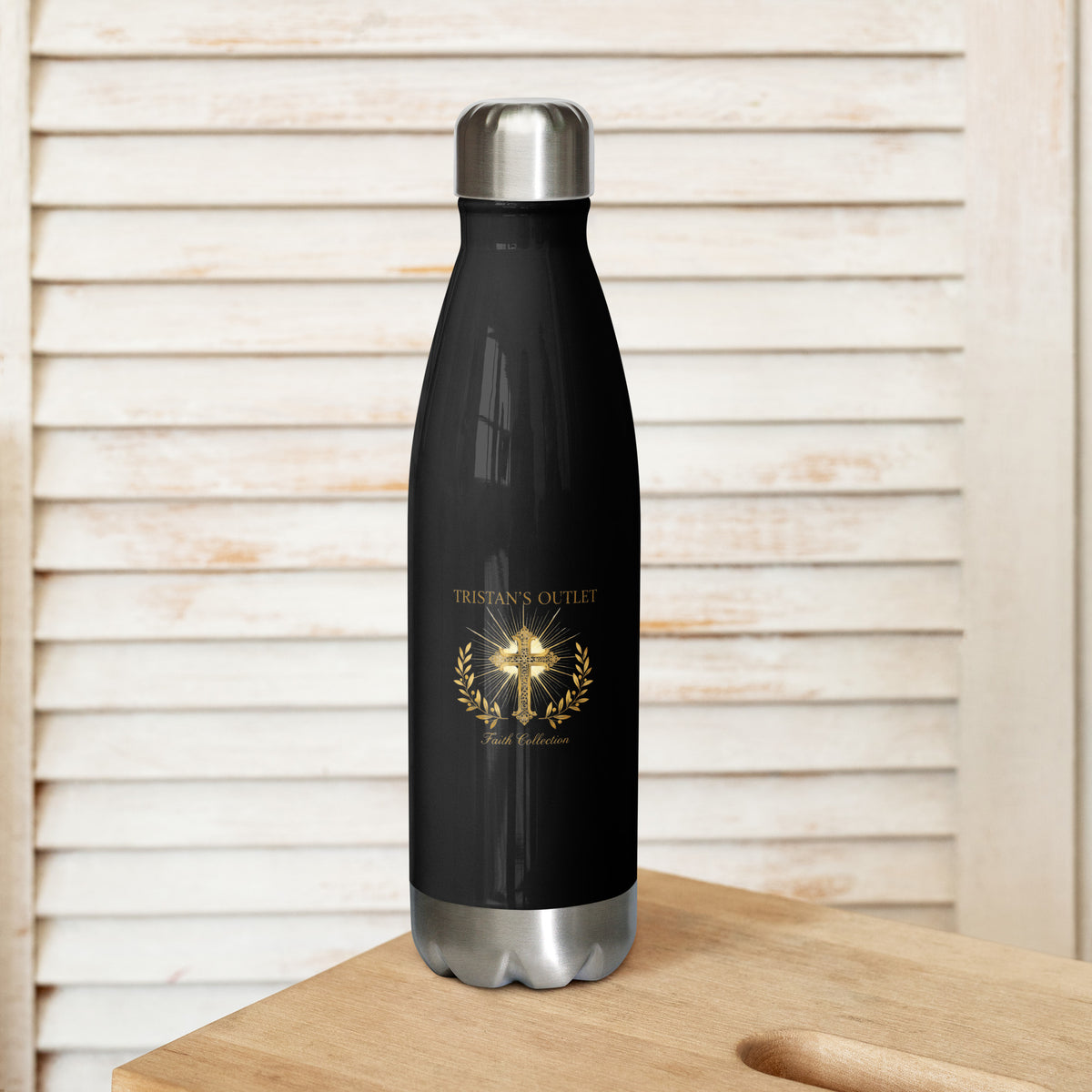 Black stainless steel insulated water bottle from Tristan's Outlet Faith Collection, 17 oz, front view showing sleek design.