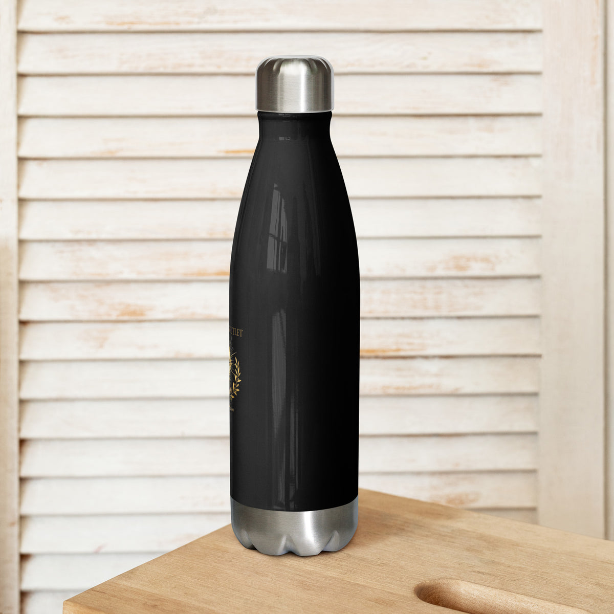 Black stainless steel insulated water bottle from Tristan's Outlet Faith Collection, 17 oz, with a sleek design and secure lid.