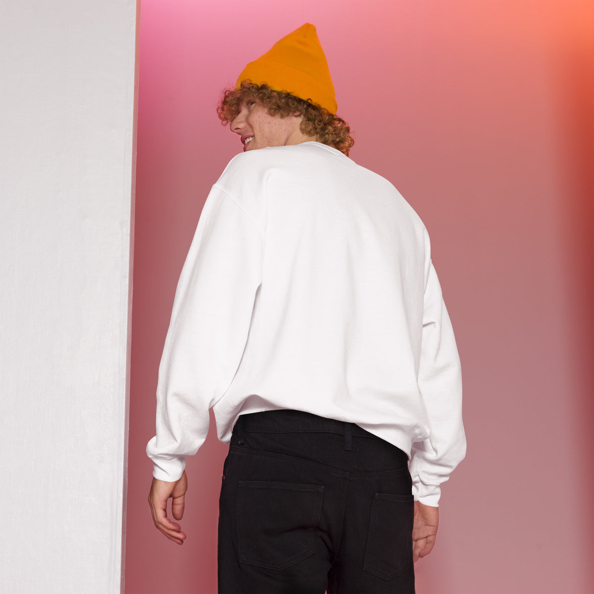 White unisex crew-neck sweatshirt with graphic print from Tristan's Outlet, displayed from the back view.