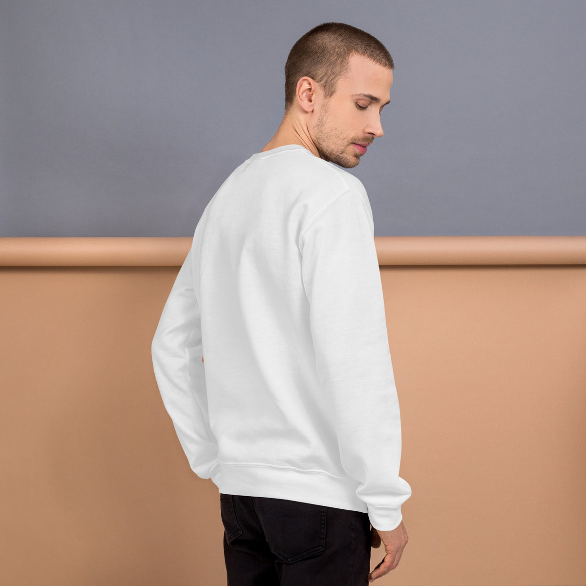 White unisex crew-neck sweatshirt with graphic print from Tristan's Outlet, casual and comfortable sweatshirt for everyday wear.
