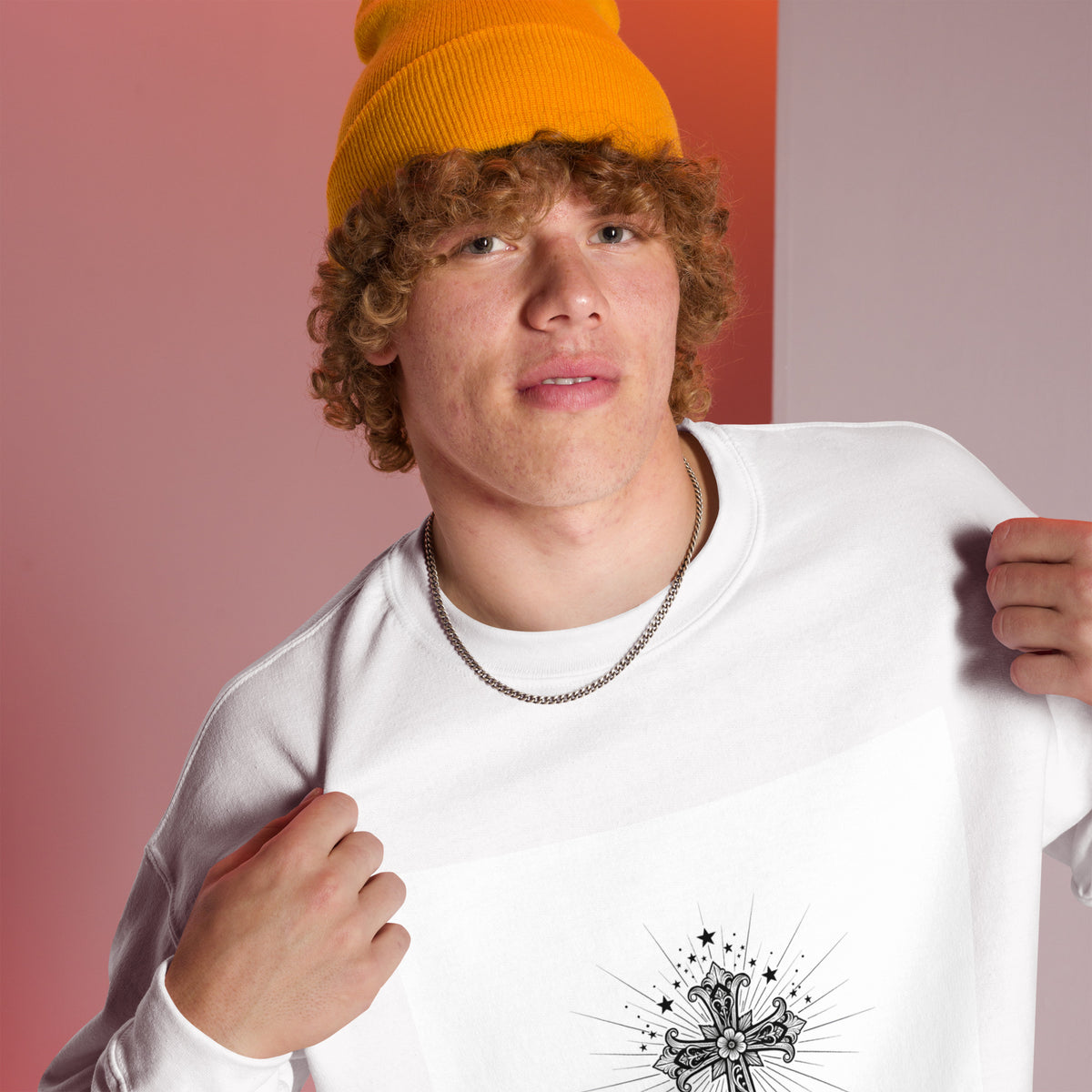 White unisex crew-neck sweatshirt with graphic print from Tristan's Outlet, shown from the right front angle.