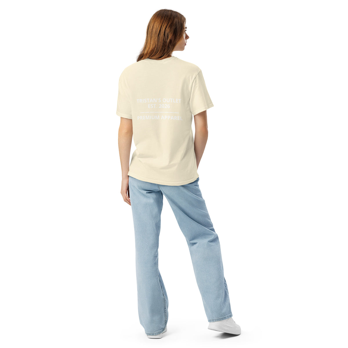 Unisex garment-dyed heavyweight ivory T-shirt by Tristan's Outlet shown from the back, casual and comfortable style.