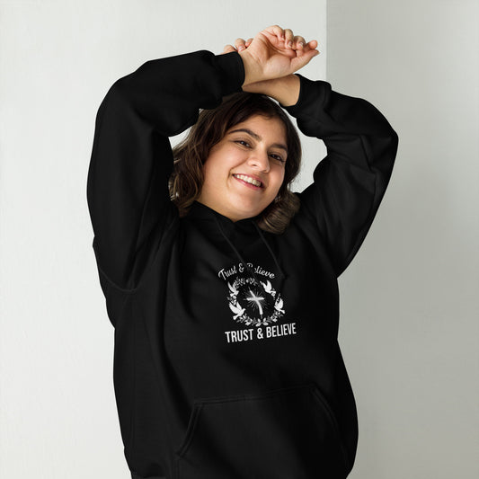 Black Trust & Believe unisex hoodie by Tristan's Outlet, front view showing style and comfortable design.