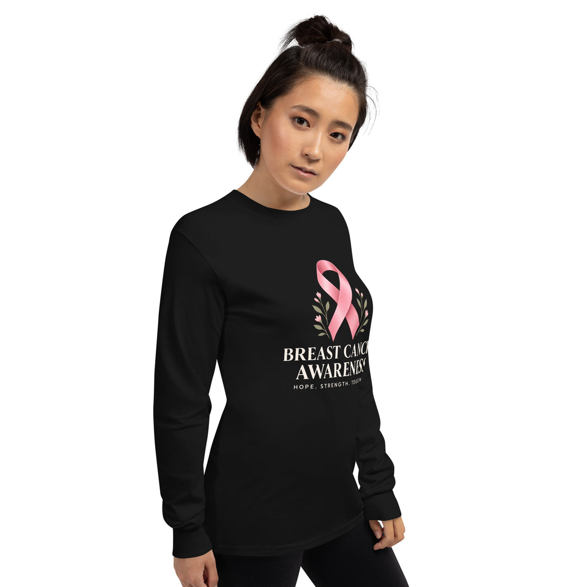 Black unisex long-sleeve shirt with breast cancer awareness support message, featuring a right-front design from Tristan's Outlet.