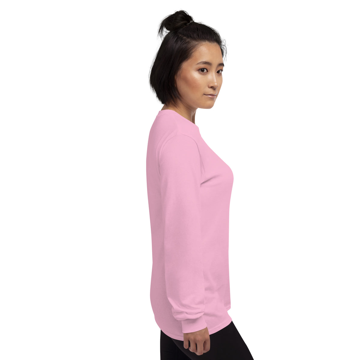 Light pink unisex long sleeve shirt from Tristan's Outlet Faith Collection, casual fit, soft fabric, photographed on a plain background.
