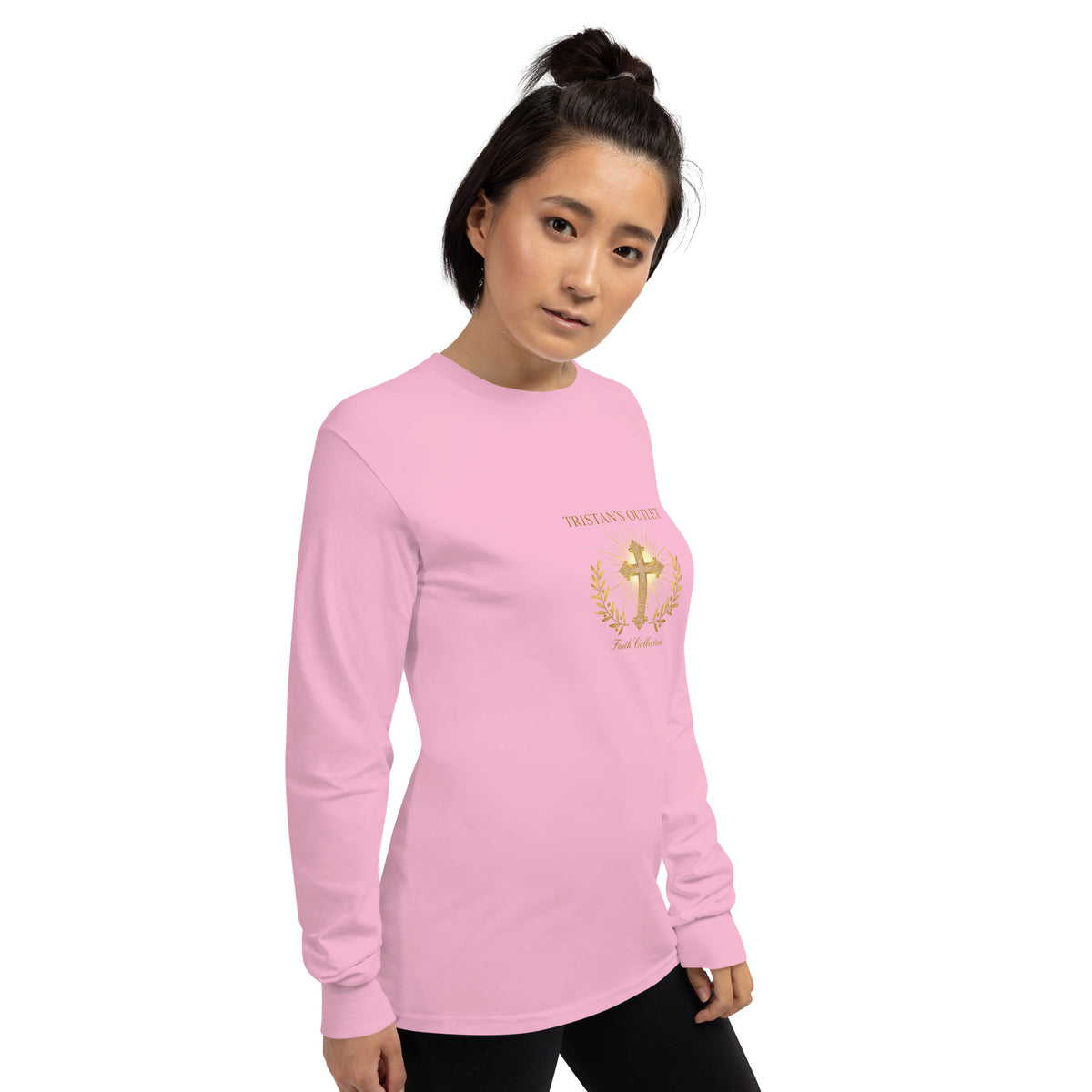 Light pink unisex long sleeve shirt from Tristan's Outlet Faith Collection, shown from the right front view.