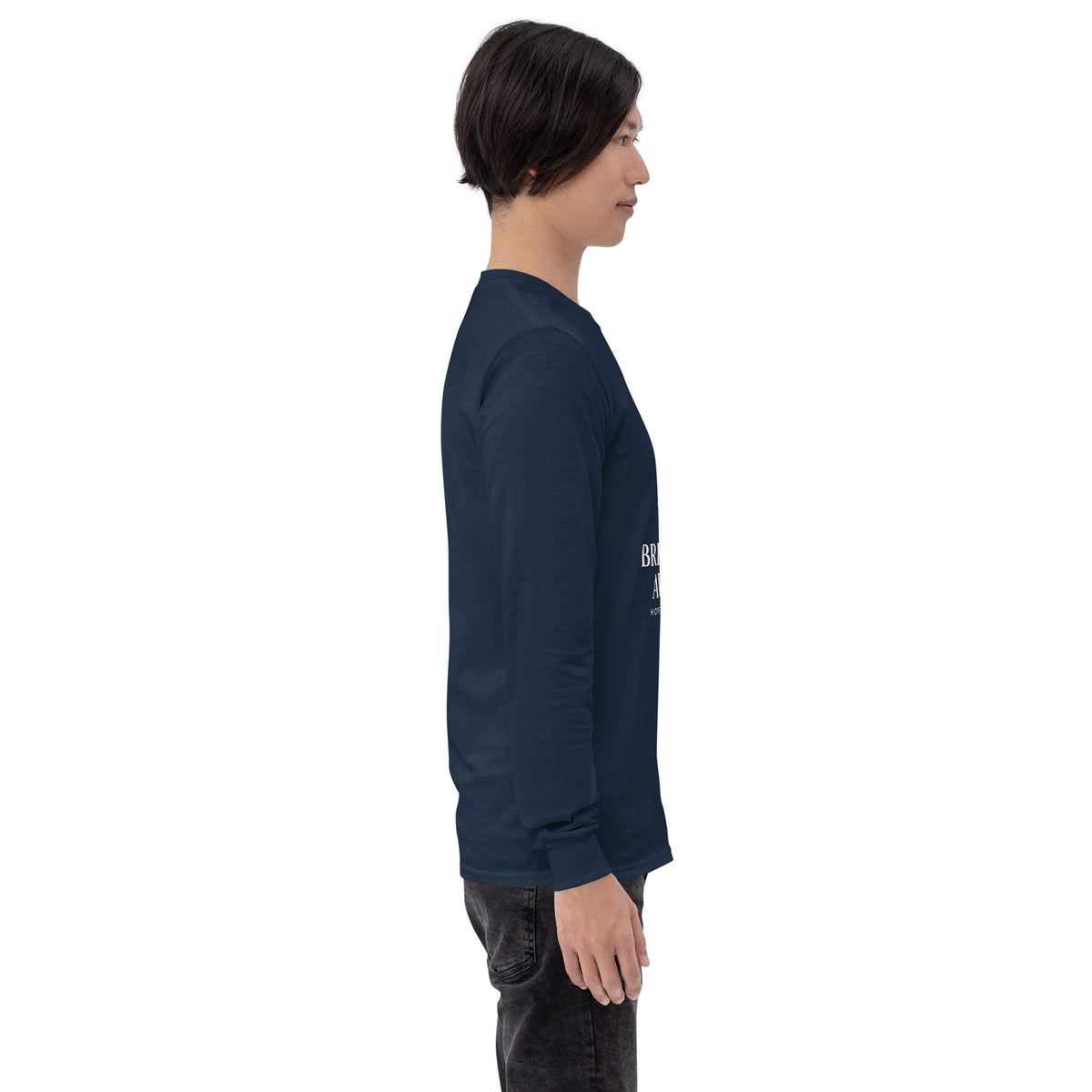 Navy unisex long-sleeve shirt supporting breast cancer awareness, featuring a supportive message, by Tristan's Outlet.