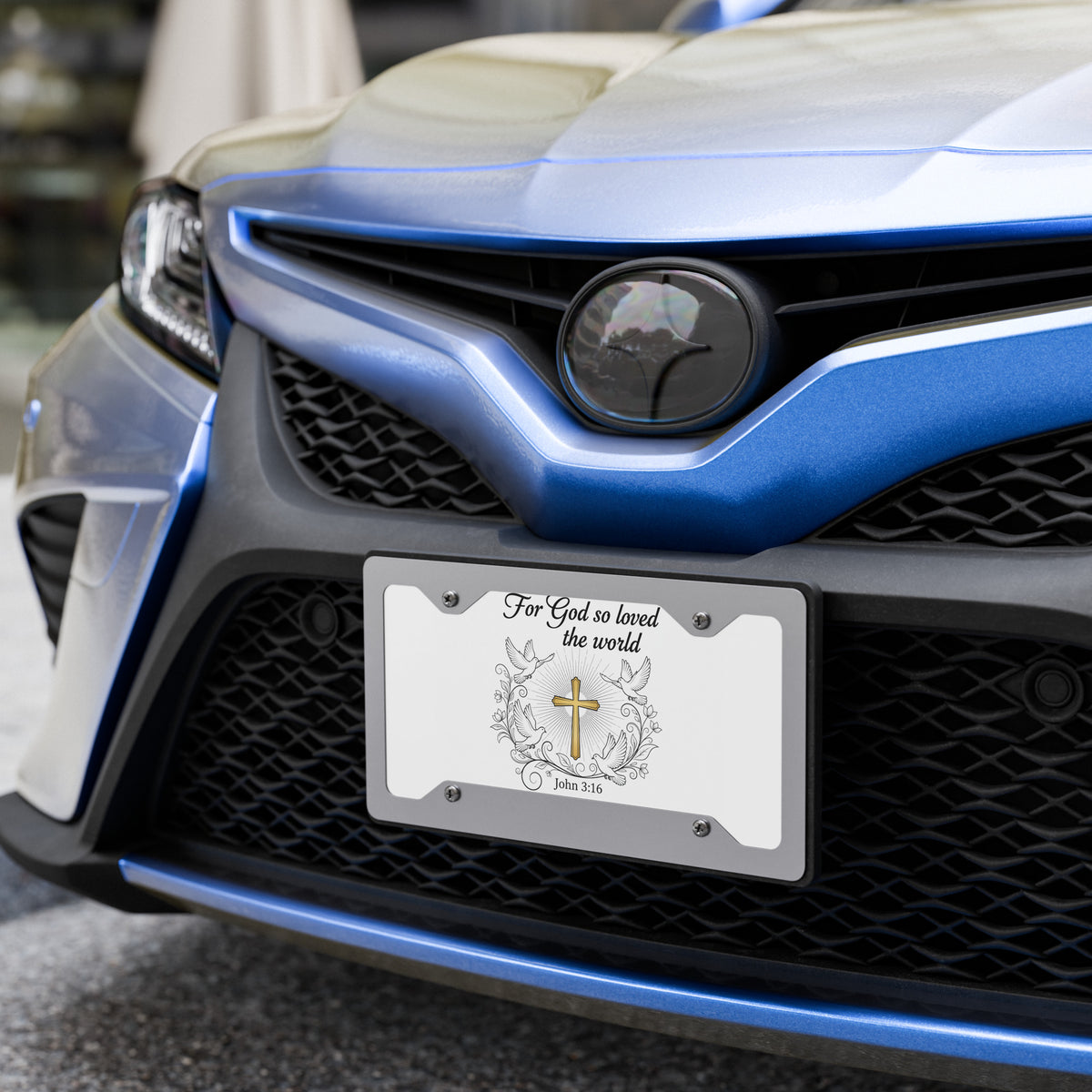 White glossy John 3:16 front license plate with black lettering, designed for vehicle front mounting, from Tristan's Outlet.
