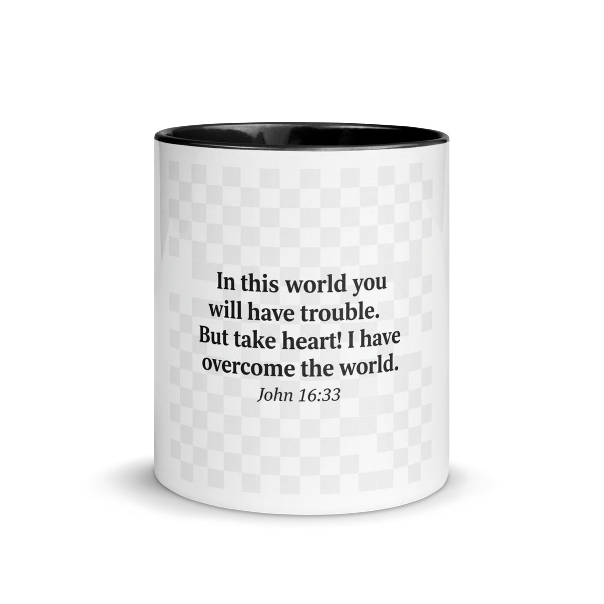 White ceramic Faith mug with black interior, 11 oz, featuring the phrase "I Have Overcome the World" on the front.