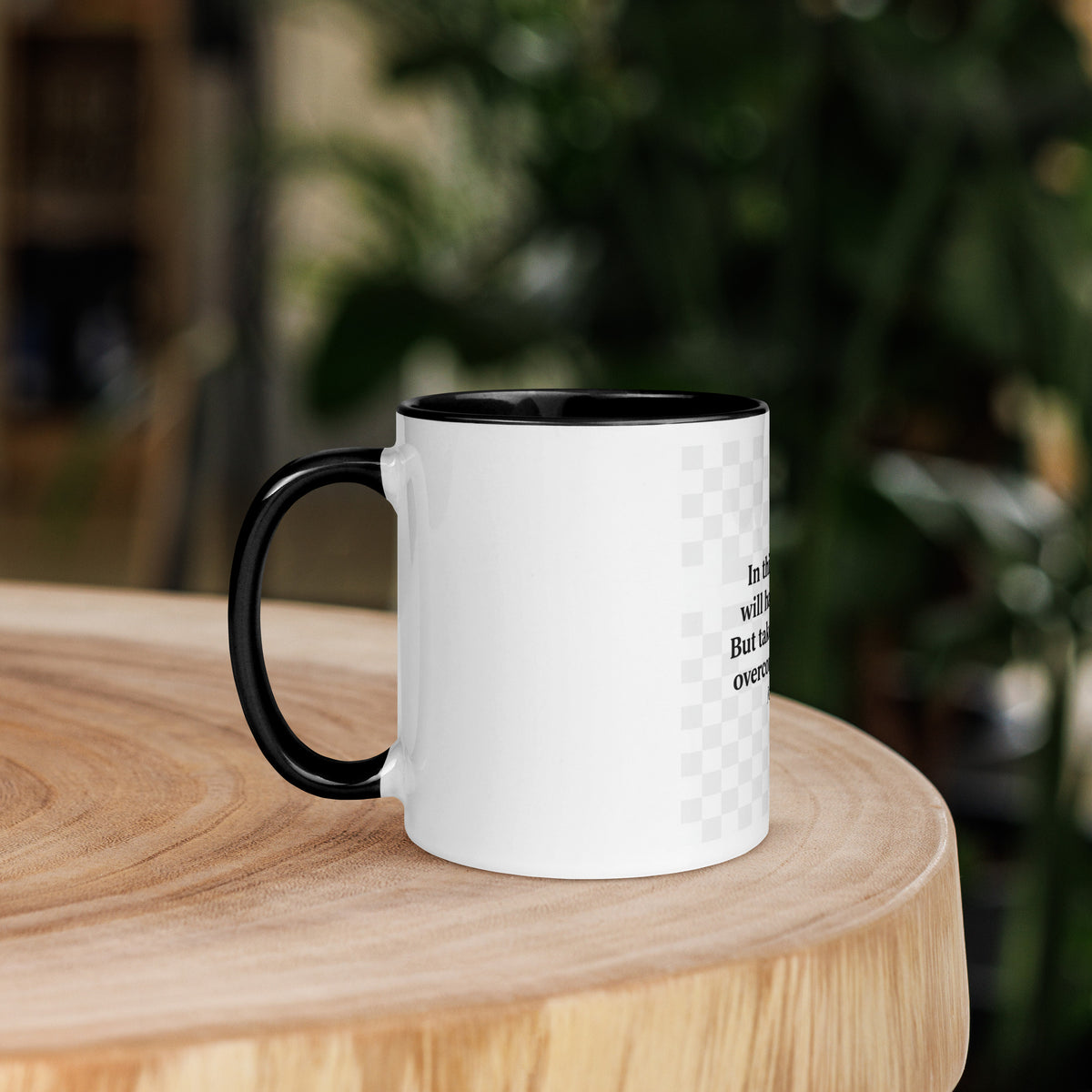 White ceramic mug with black interior, 11 oz, featuring the "I Have Overcome the World" design, from Tristan's Outlet drinkware collection.