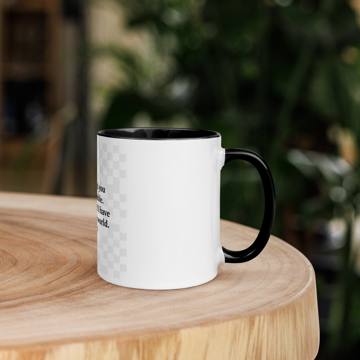 White ceramic mug with black interior and "I Have Overcome the World" inscription, 11 oz, from Tristan's Outlet drinkware collection.