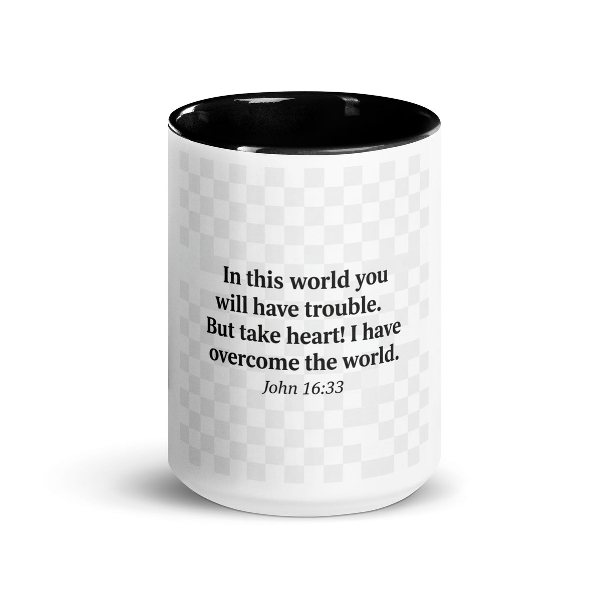 White ceramic mug with black interior and the message "I Have Overcome the World" in black lettering, 15 oz drinkware by Tristan's Outlet.