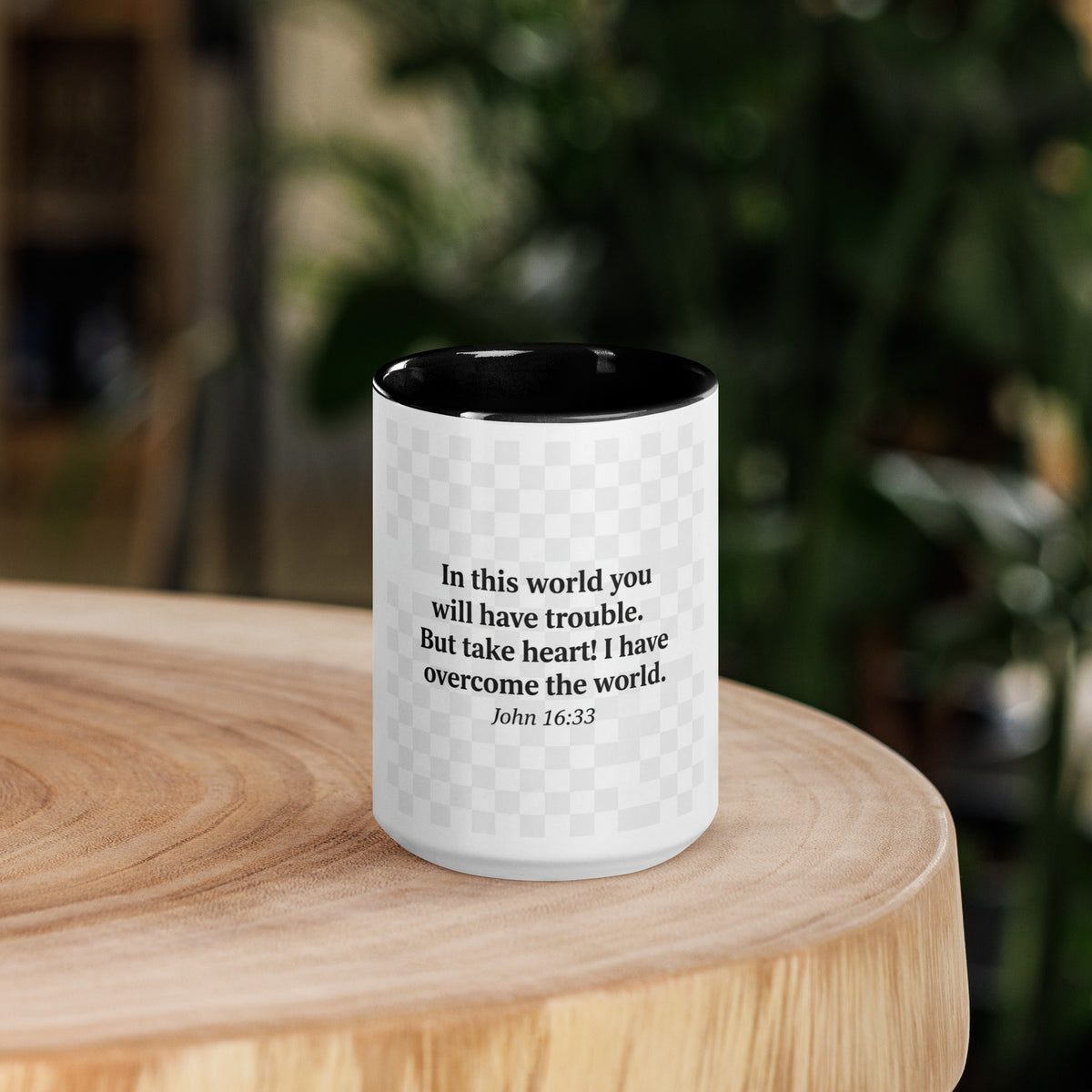 White ceramic mug with a black interior, 15 oz, featuring the "I Have Overcome the World" design from Tristan's Outlet.