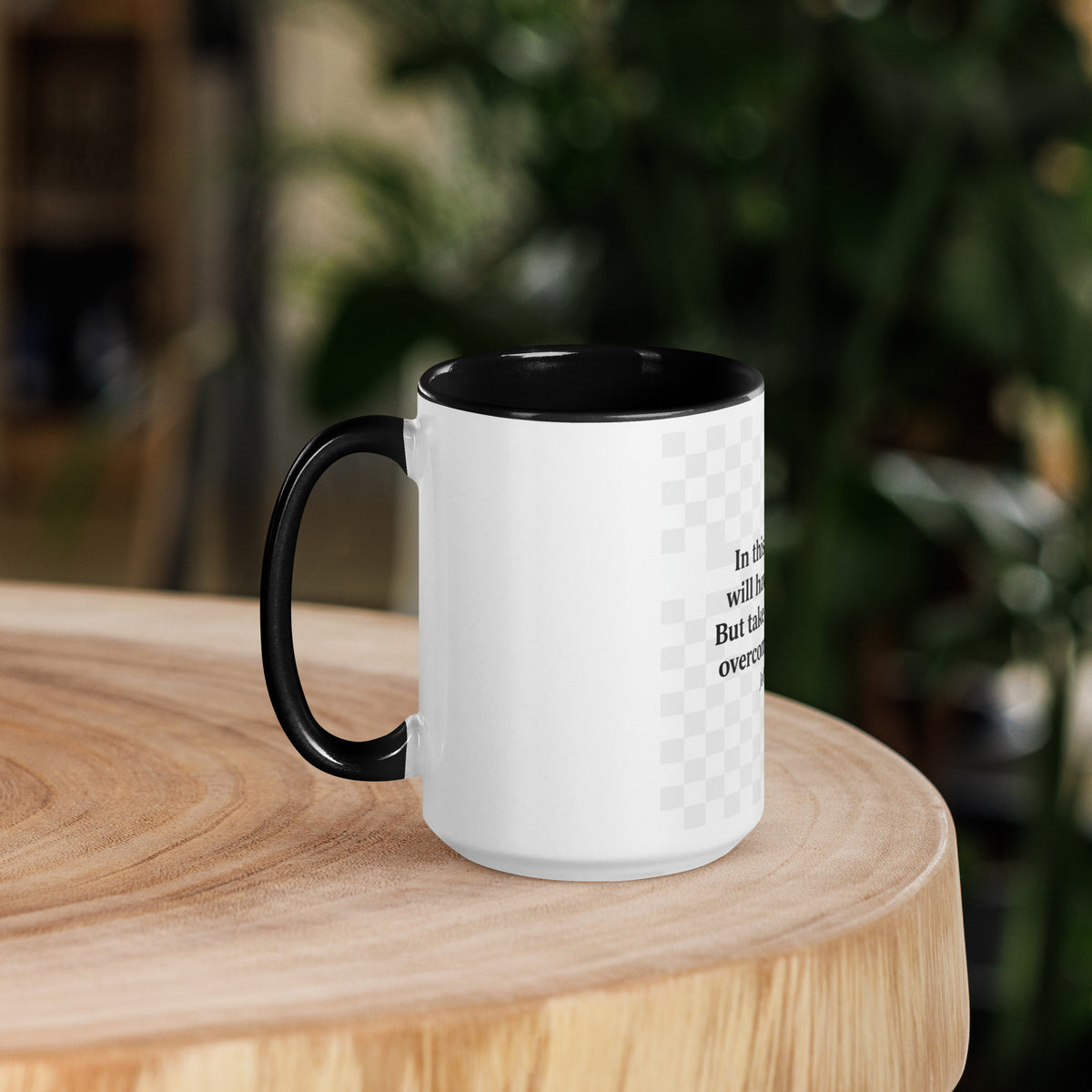White ceramic mug with black interior, 15 oz, featuring the phrase "I Have Overcome the World" for inspirational drinkware.
