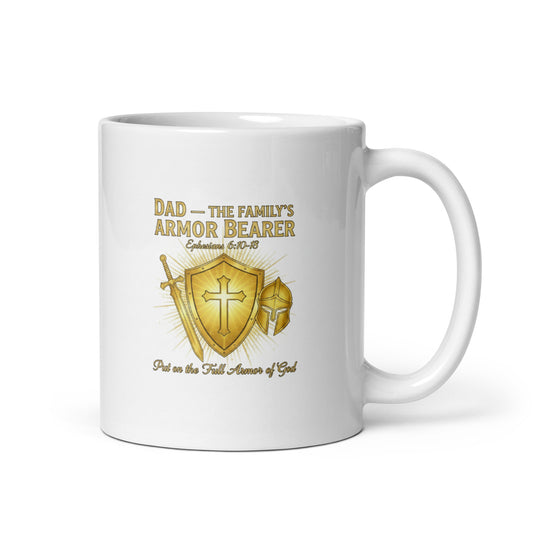 White glossy 11 oz ceramic mug featuring "Dad – The Family's Armor Bearer" text, with handle on the right.