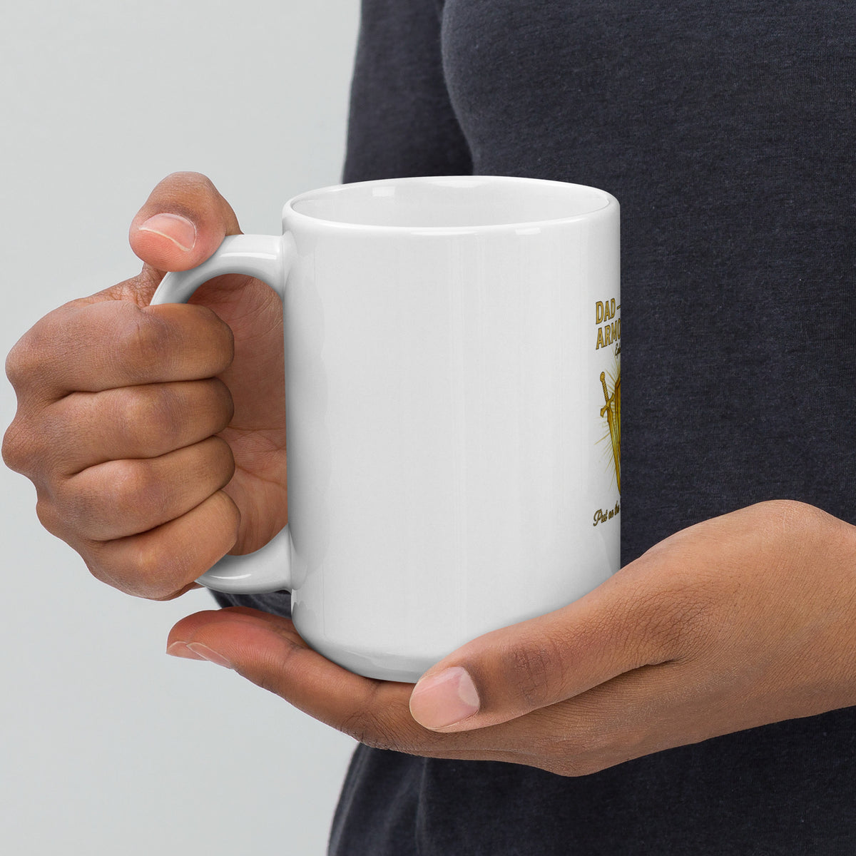 White 15 oz ceramic mug featuring "Dad – The Family's Armor Bearer" design, with a handle on the left, by Tristan's Outlet.